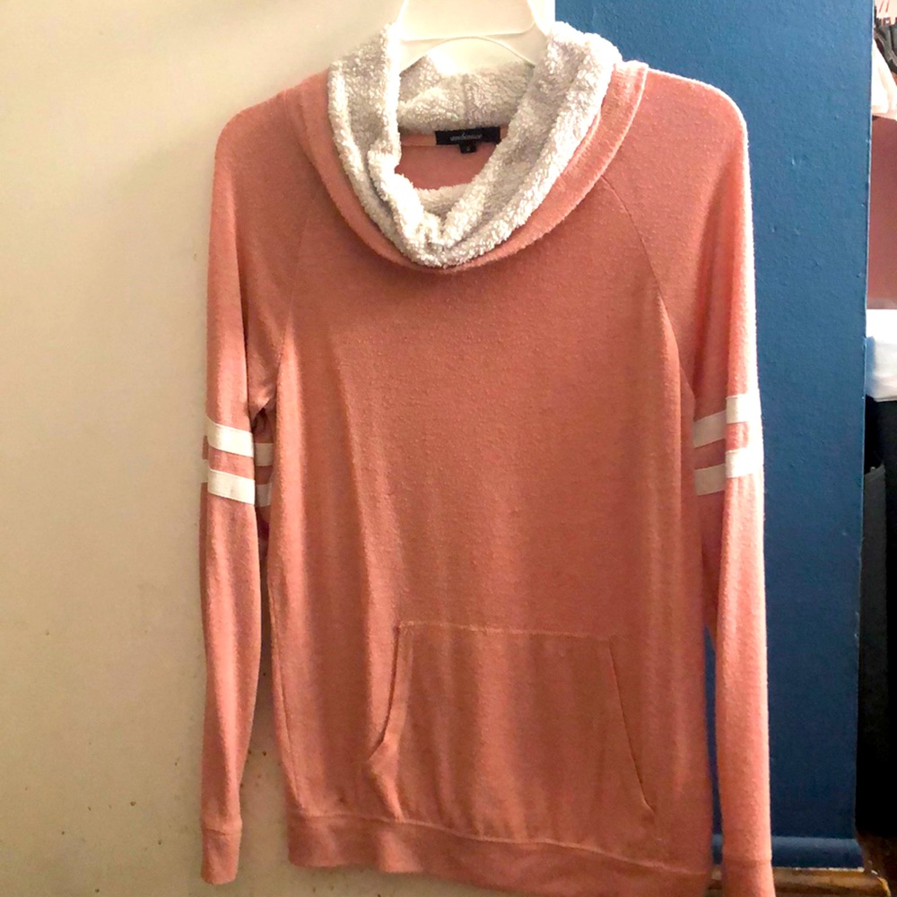 a long sleeve with a puffy neck area